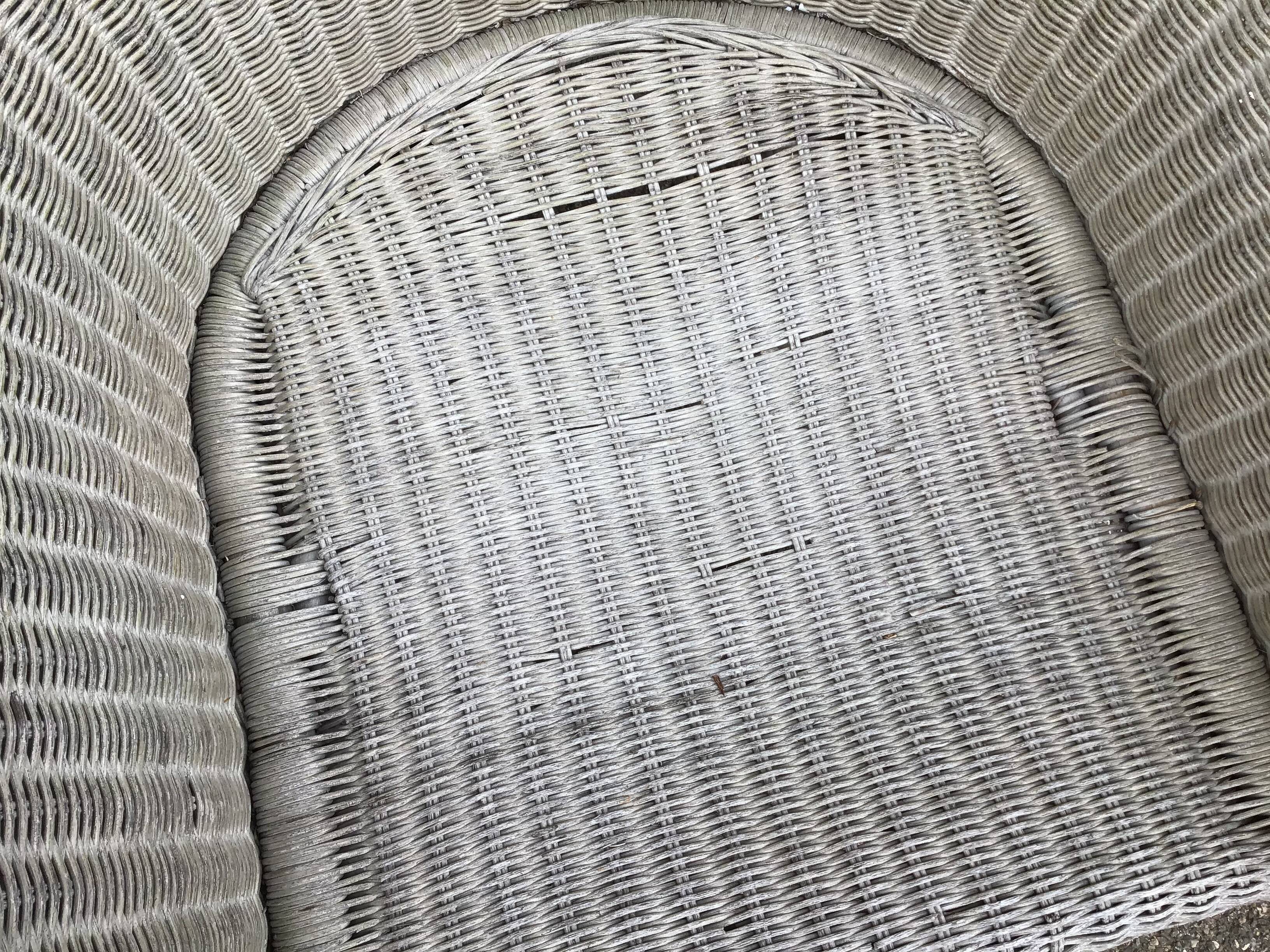 2 vintage grey rattan armchairs from the 60s
