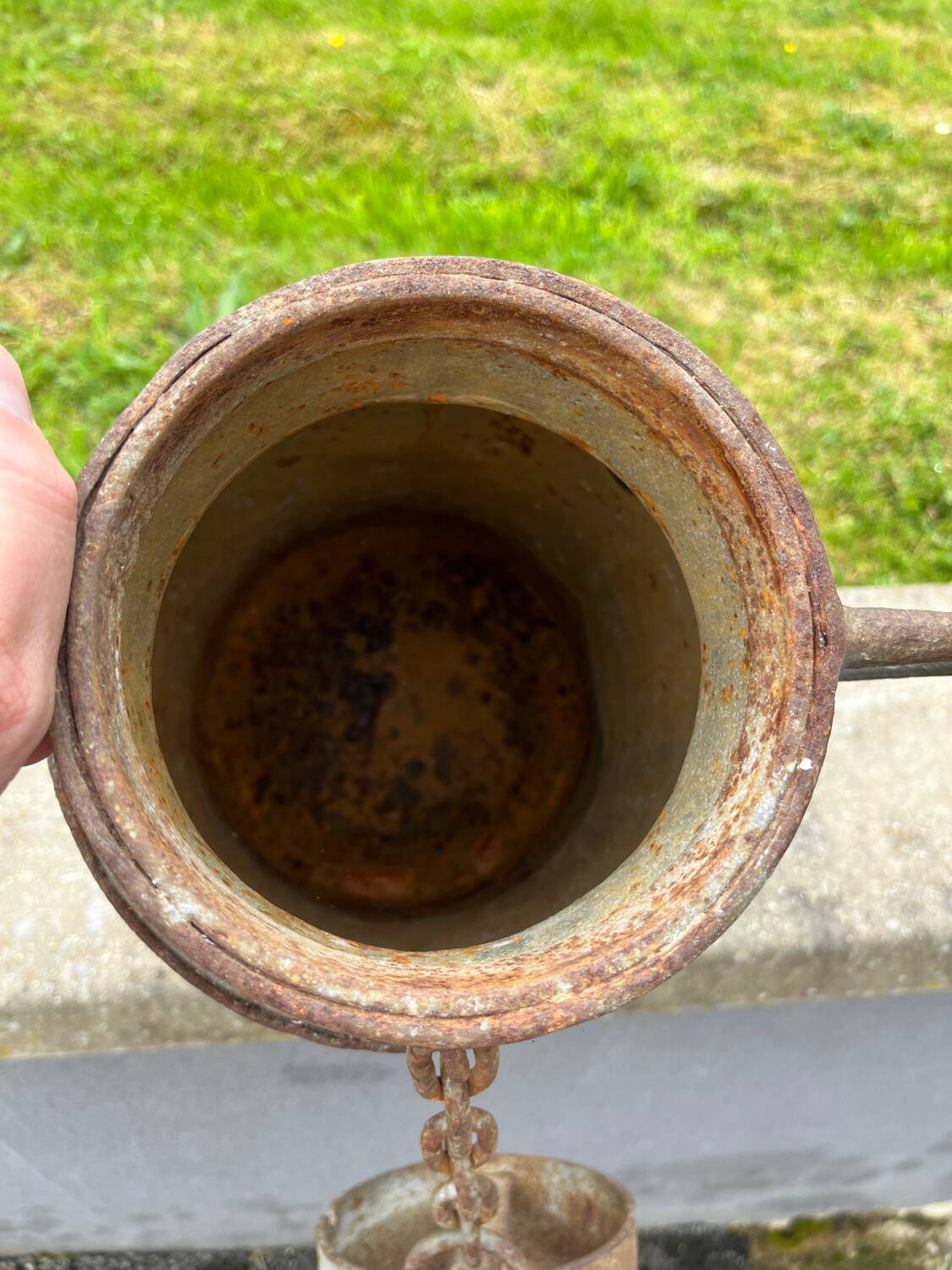 Old metal can or milk jug