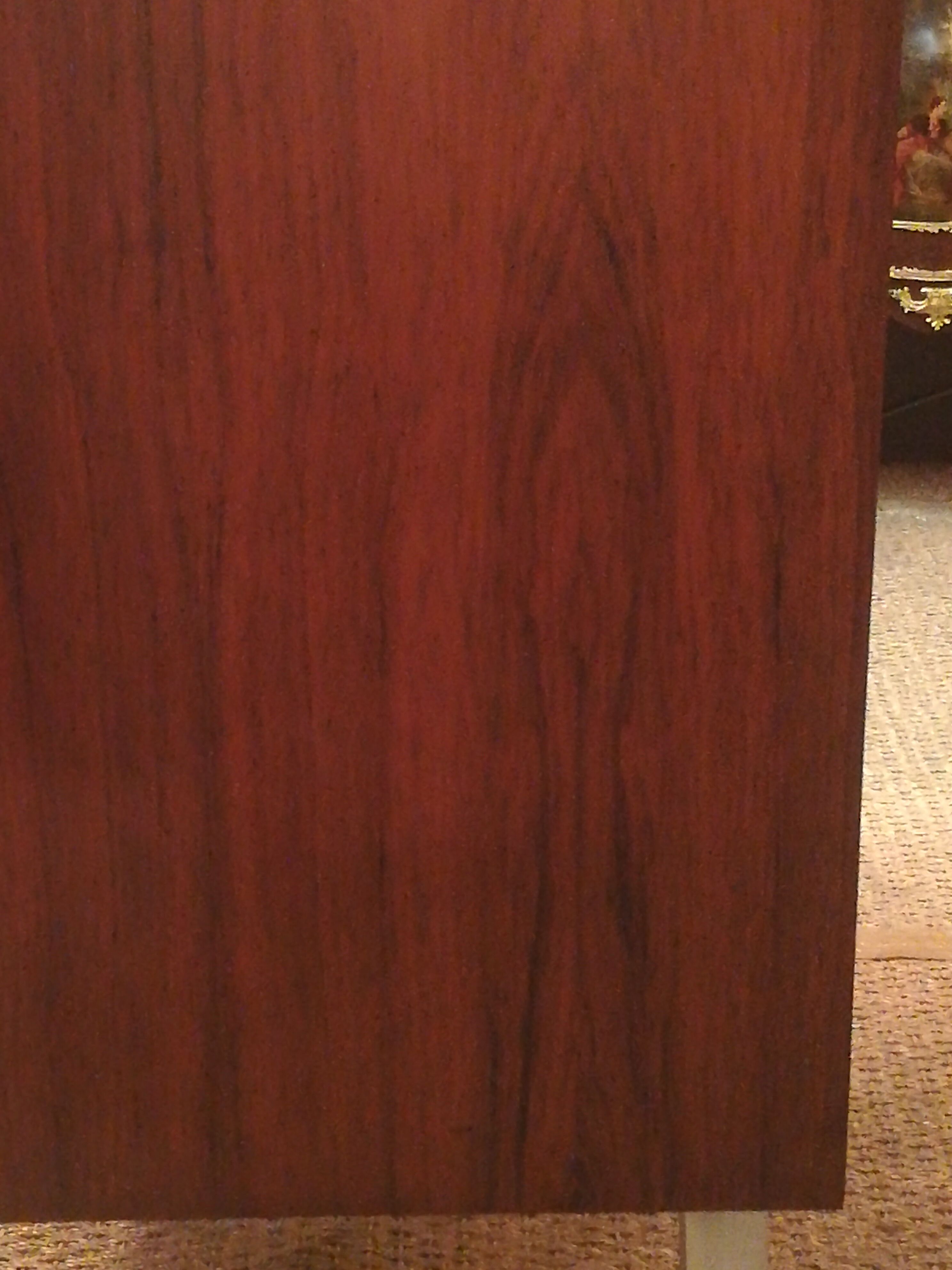 Rosewood and brushed metal chest of drawers