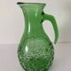 Pichet en verre vert décoré de bulles