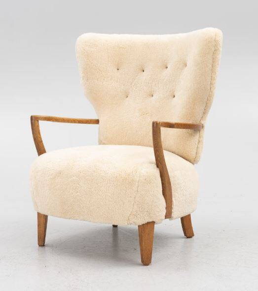 Danish armchair. upholstered with Australian lambskin. Danish Cabinmaker, 1940's