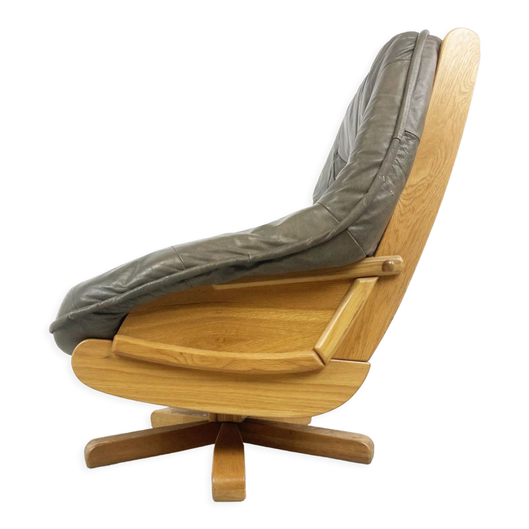 Brutalist oak and leather swivel chair, 1970s