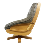 Brutalist oak and leather swivel chair, 1970s