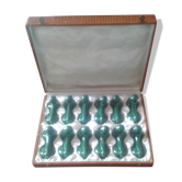 Coffret de 12 portes couteaux forme caniche en ceramique