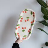 Old cake dish in cherry slip