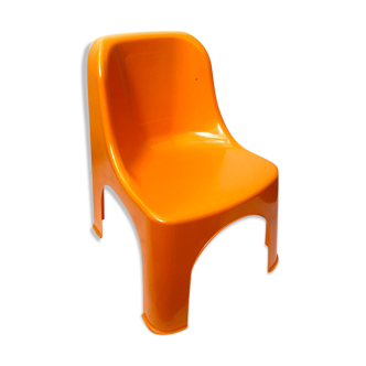 Children's chair in orange plastic