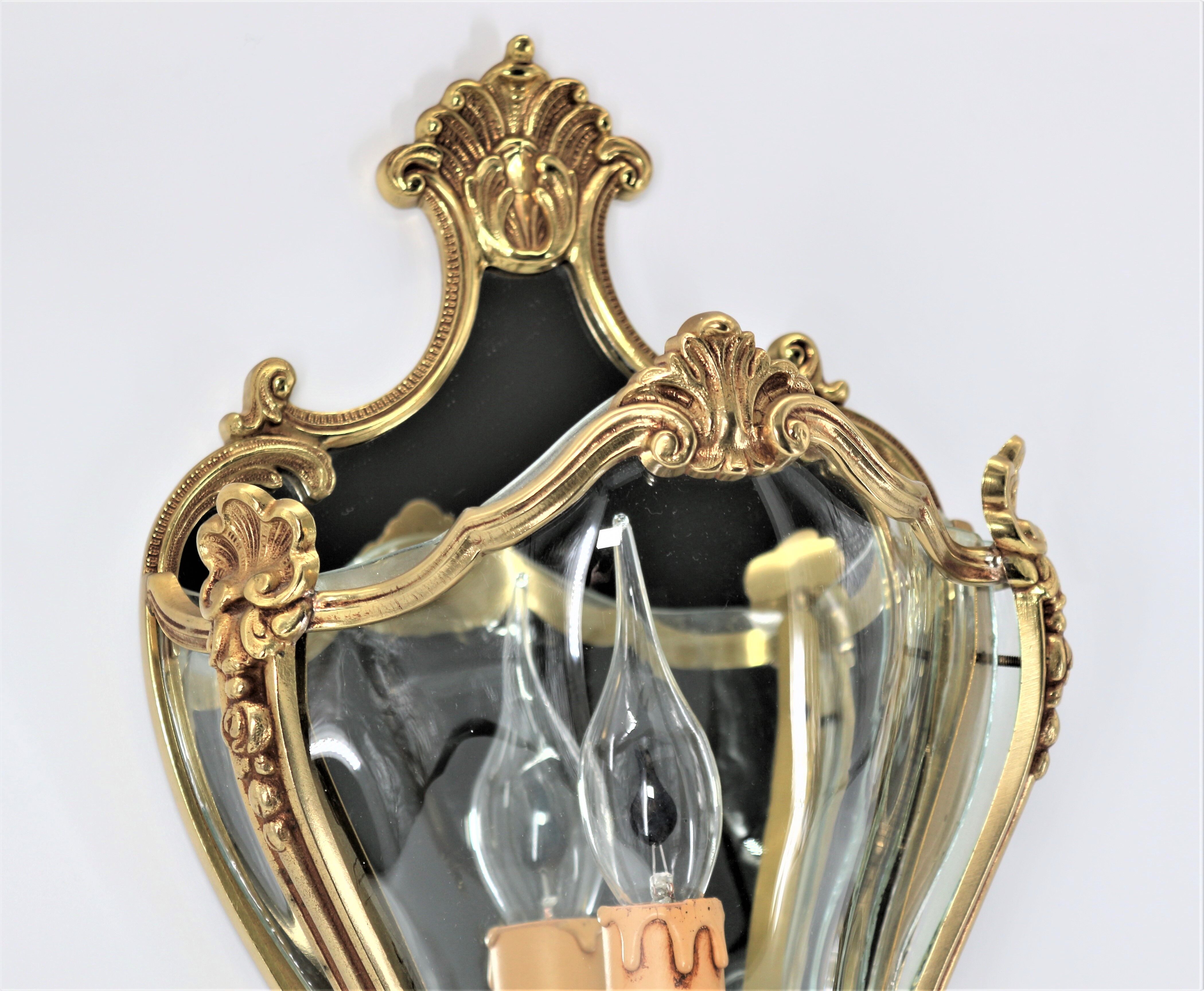 Pair of Louis XV style appliques in solid bronze & curved glass