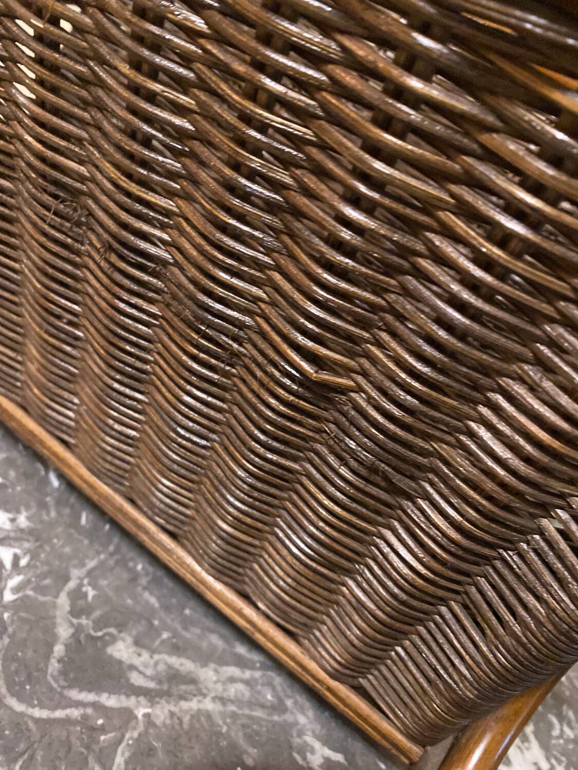 Wicker and brown wood magazine rack