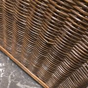 Wicker and brown wood magazine rack