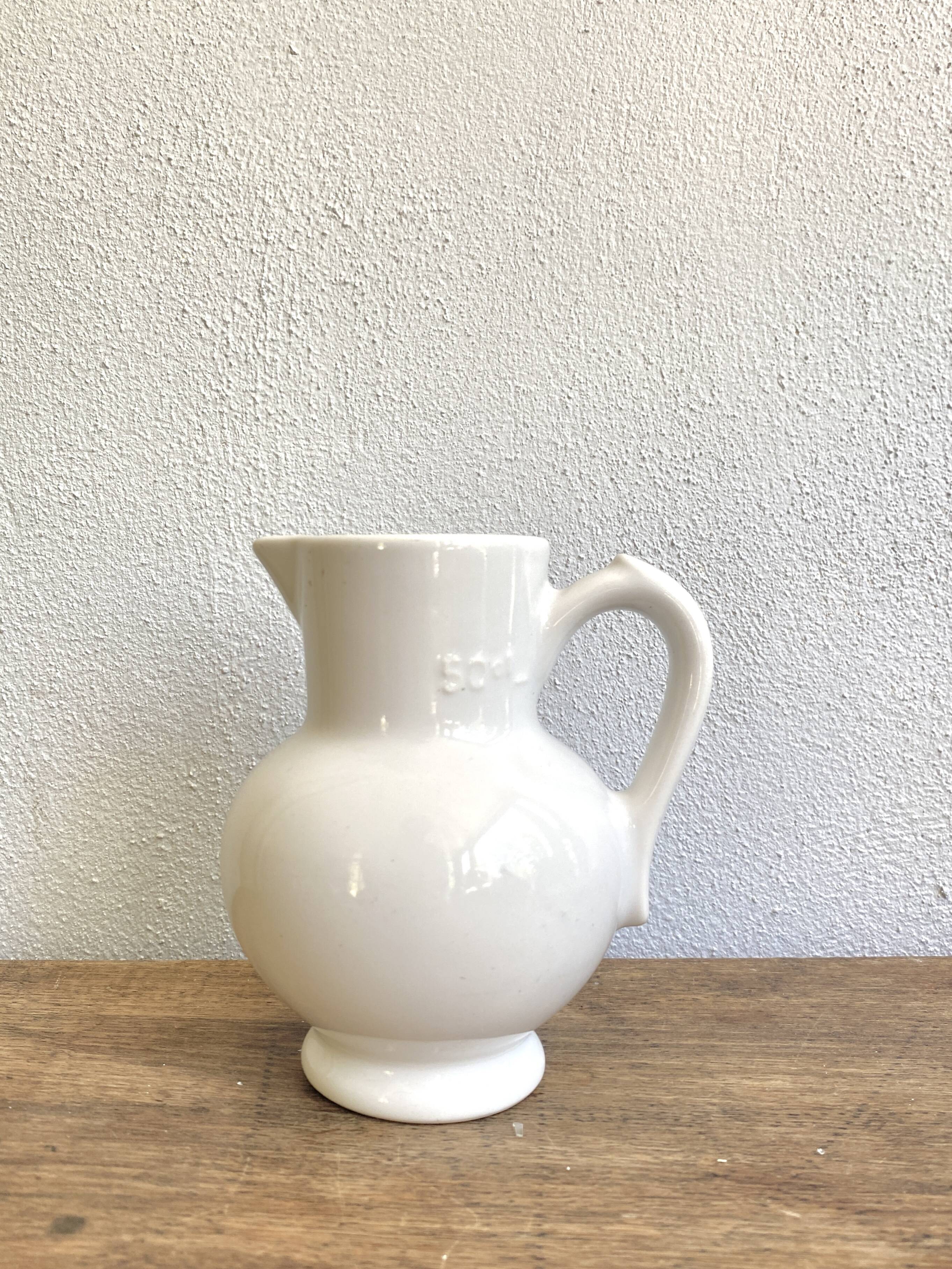 Enamelled earthenware pitcher, Danish style