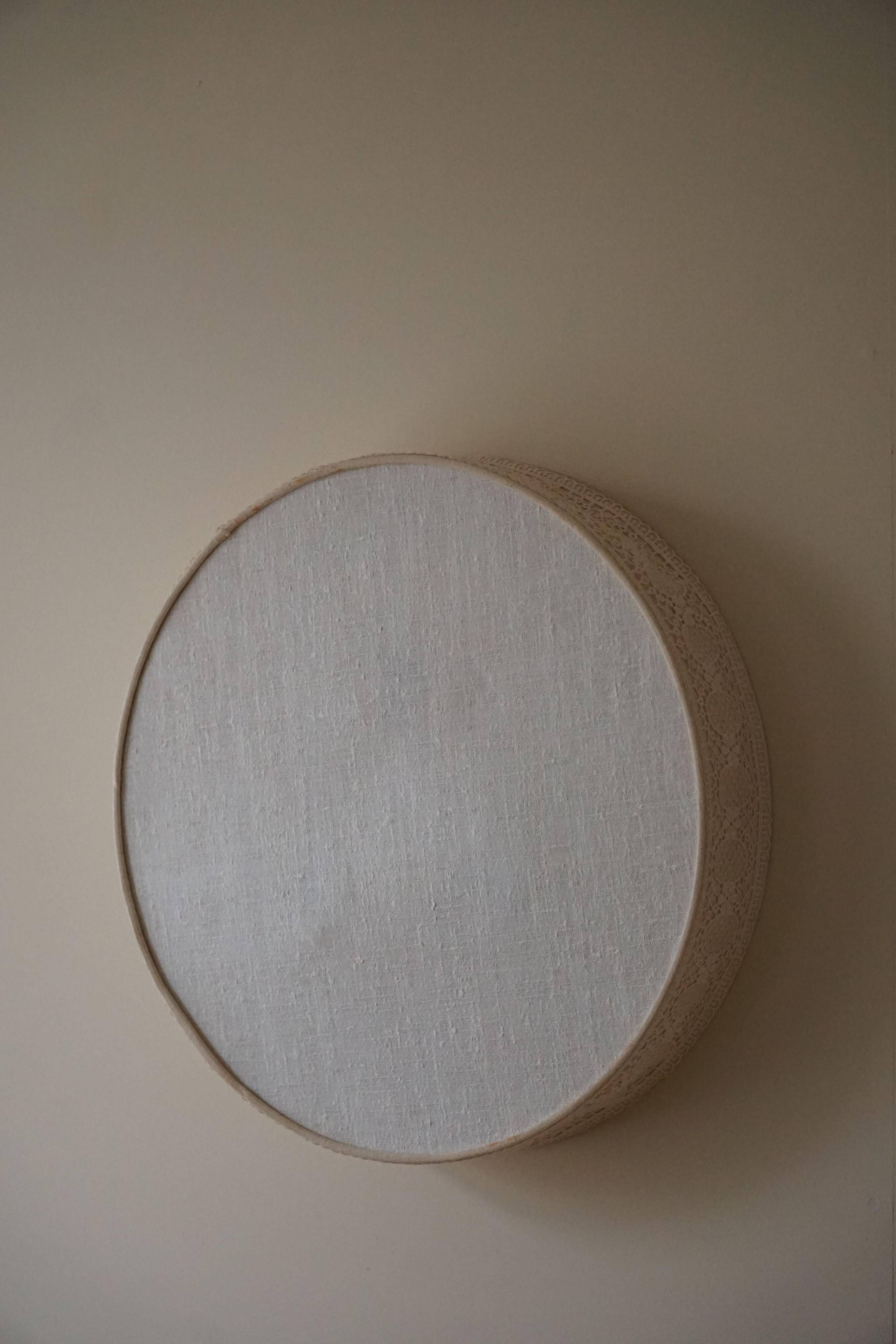 Mid-century modern wall sconce and ceiling light in linen and lace, Sweden, 1950s.