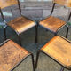 Set of 4 mismatched chairs vintage school mullca communities