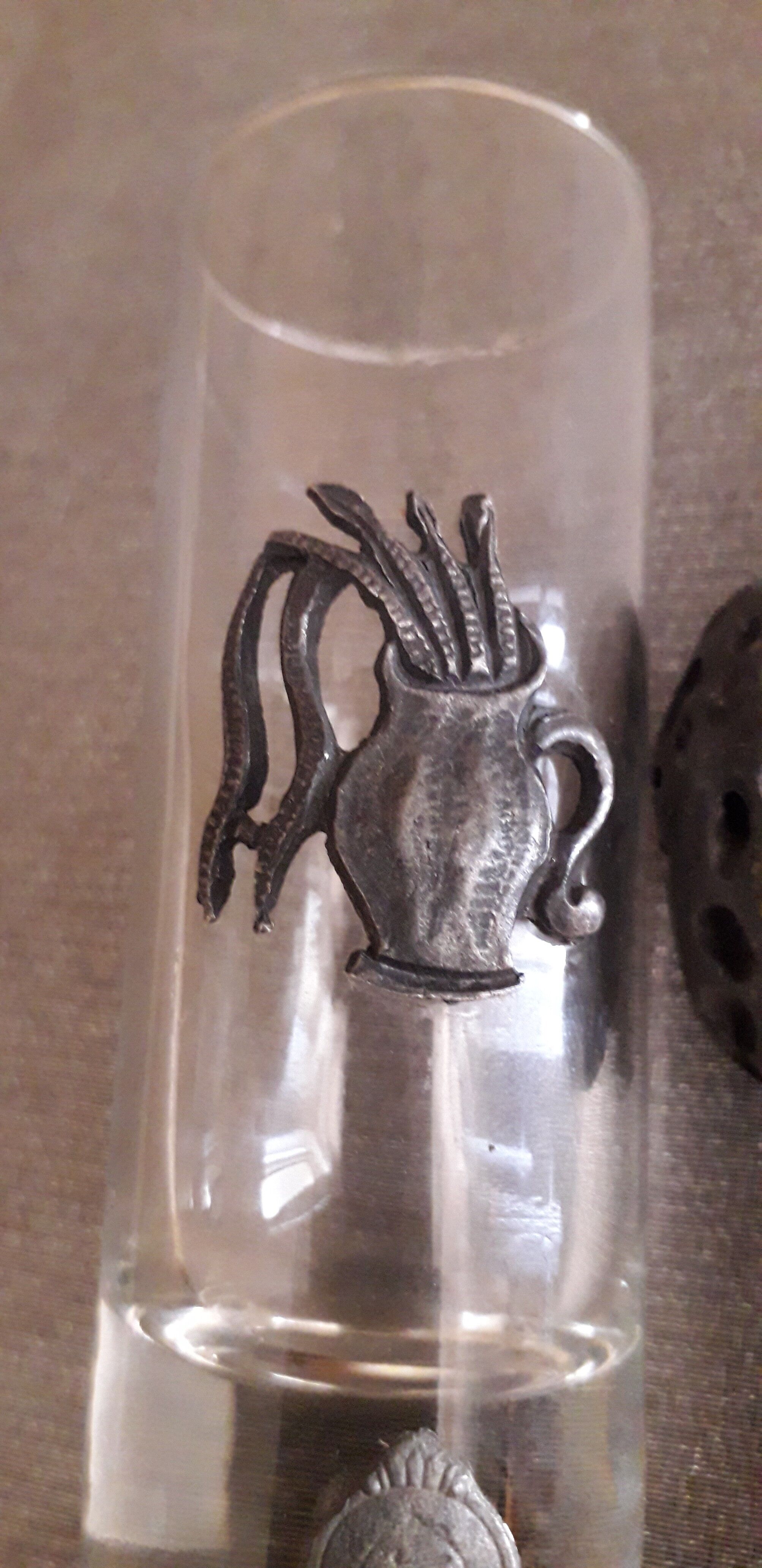 Glass liquor glass with tin sconces signed J.de Rey