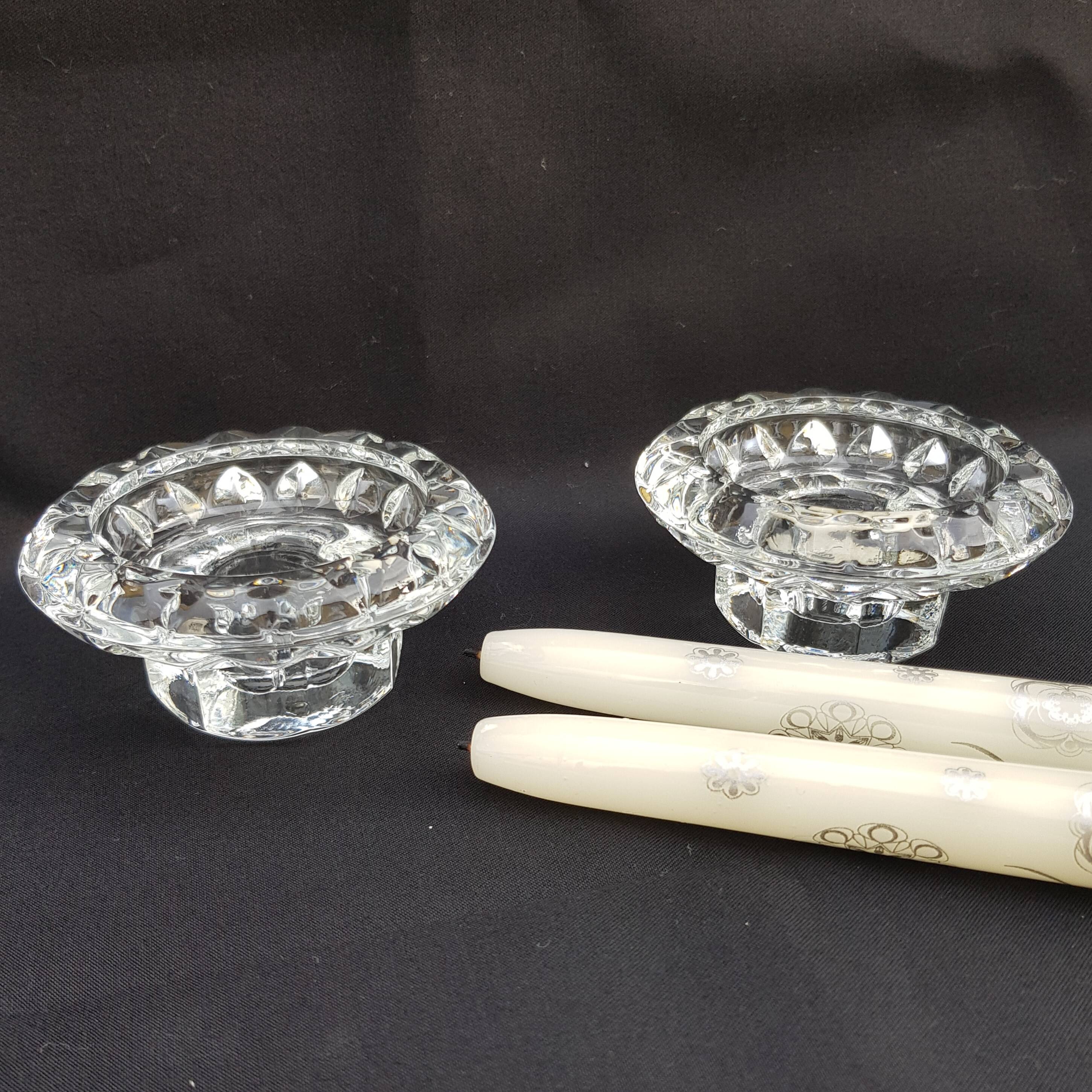 Duo of old glass candlesticks