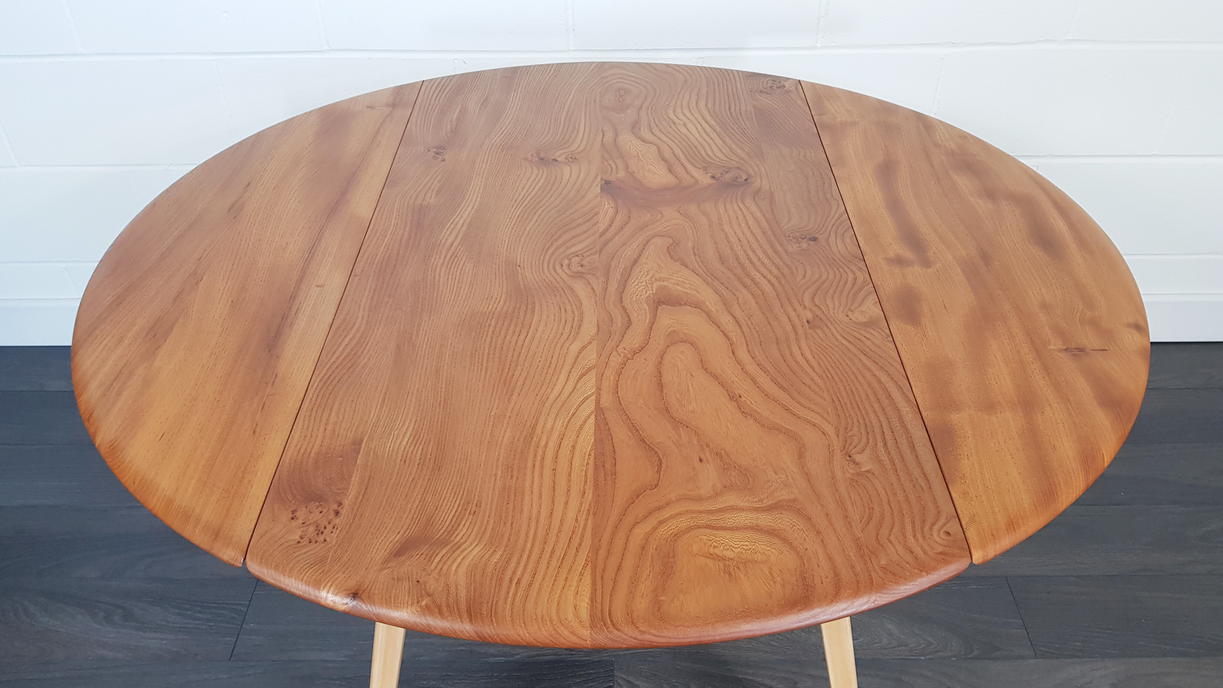 Ercol round drop leaf dining table, 1960s