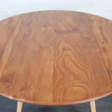 Ercol round drop leaf dining table, 1960s