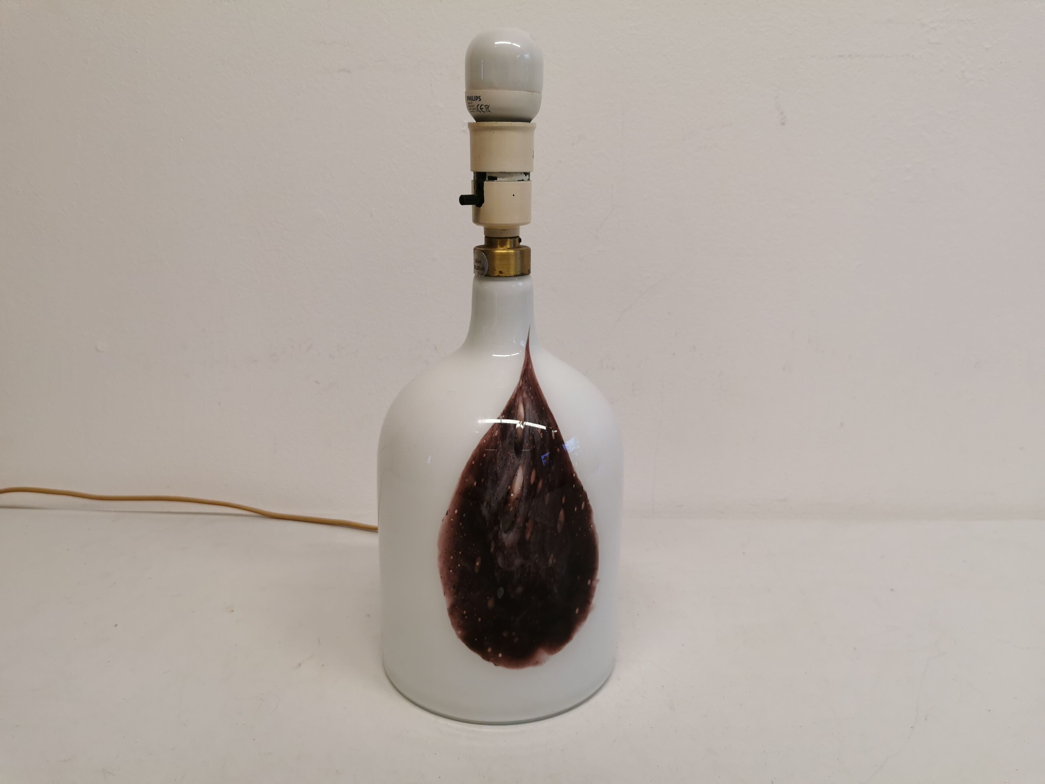 Older table lamp in milky white opaline glass with purple pattern / details from danish holmegaard.