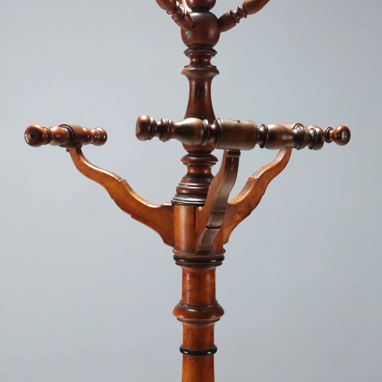 Antique coat rack in lime wood stained walnut, Italy, 19th century.