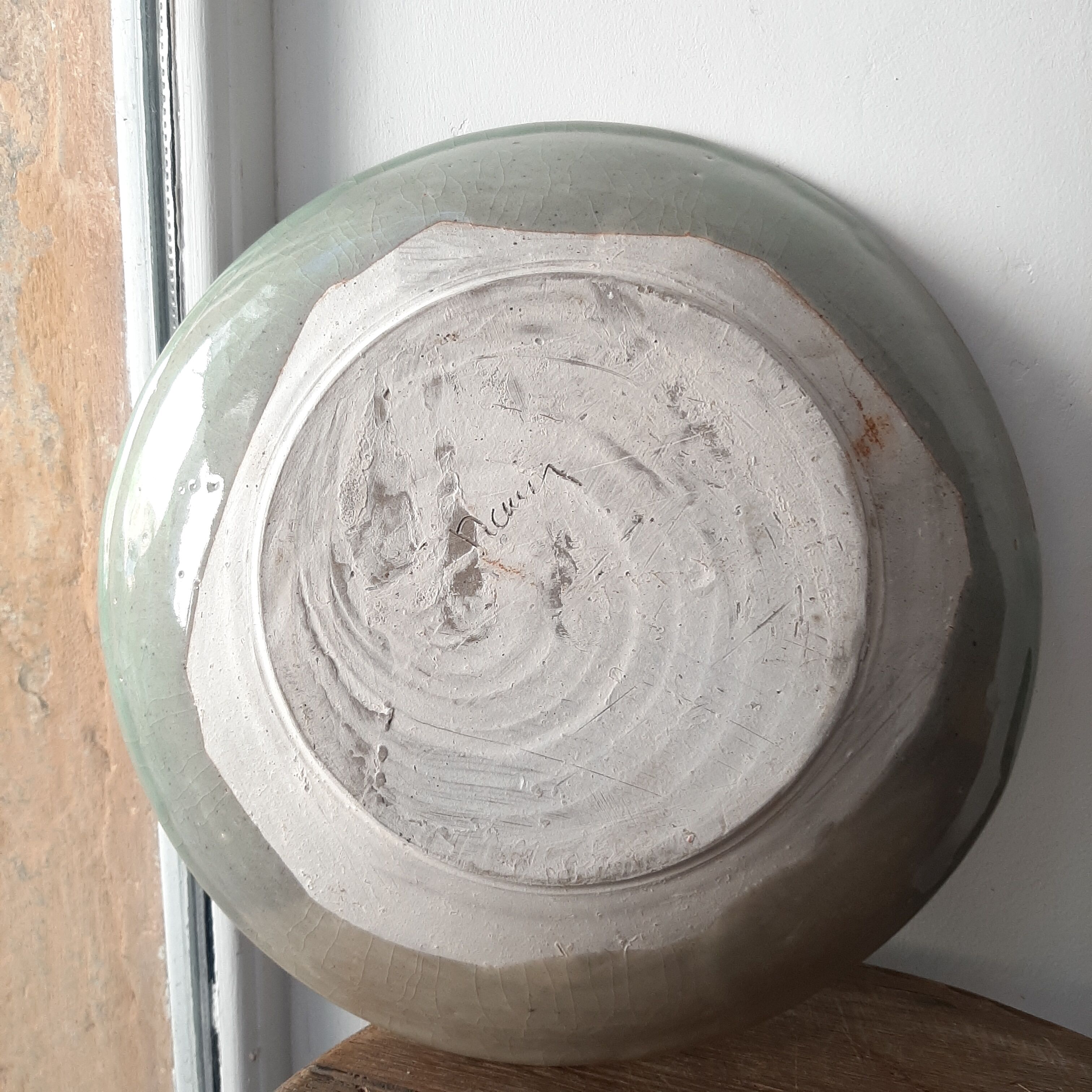 Signed sandstone dish