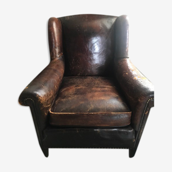 Vintage eared armchair. England