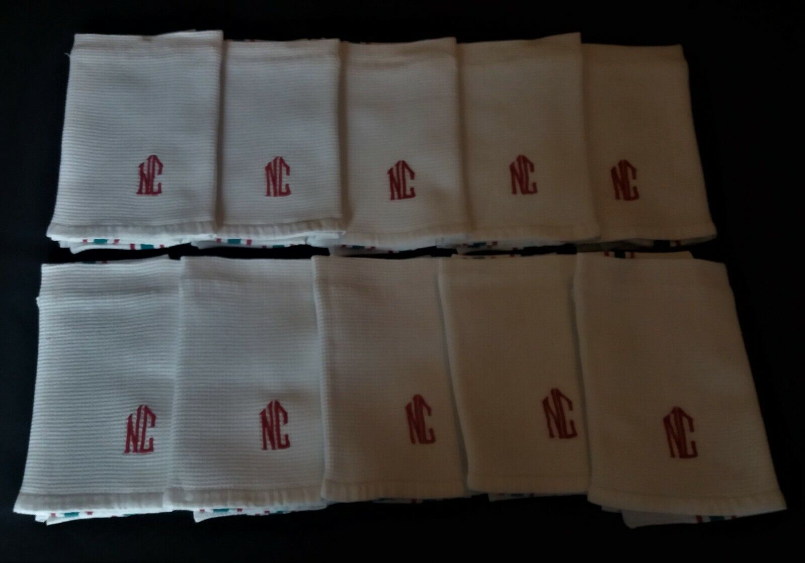Set of ten antique cotton honeycomb towels hand-embroidered figure