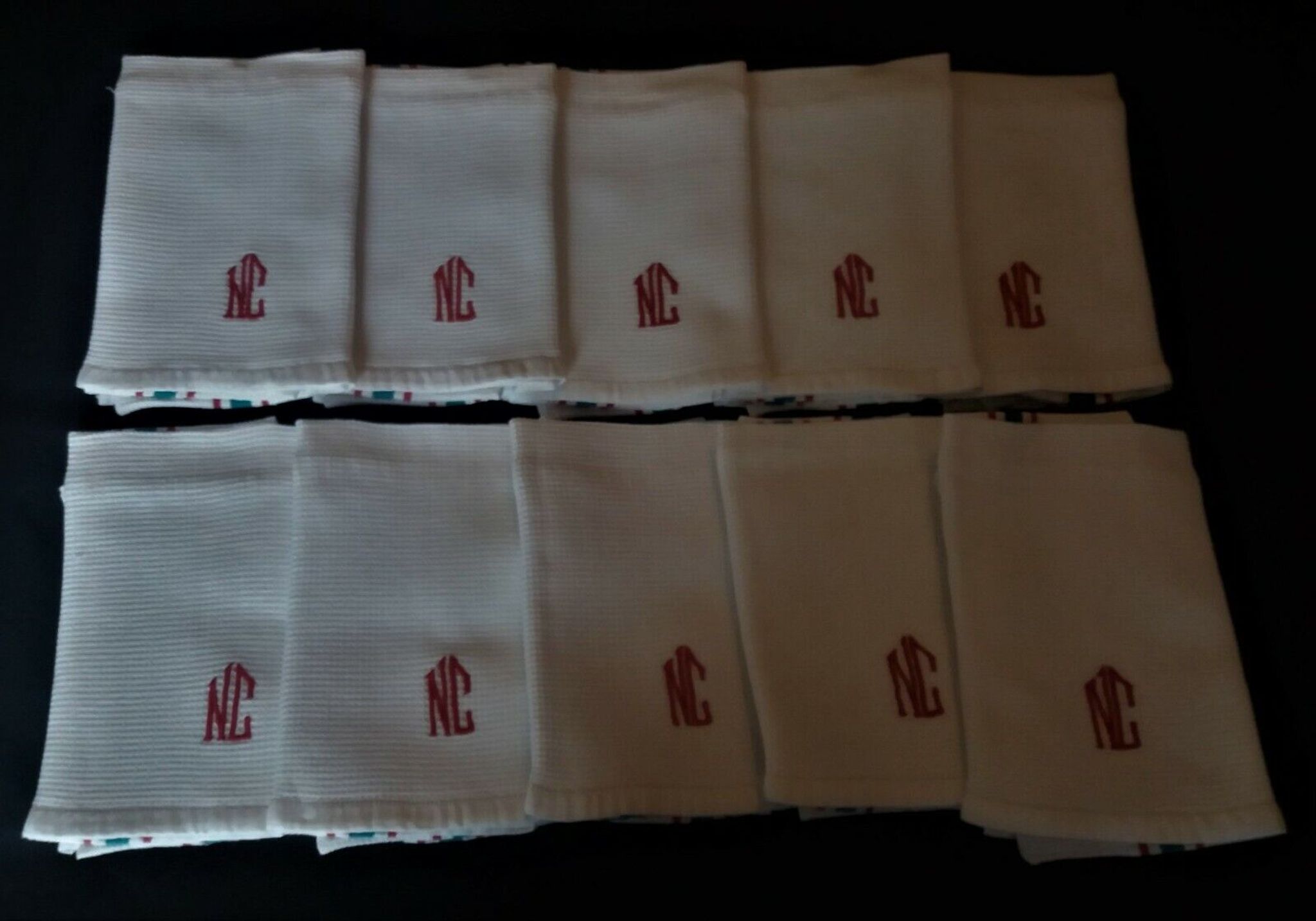 Set of ten antique cotton honeycomb towels hand-embroidered figure