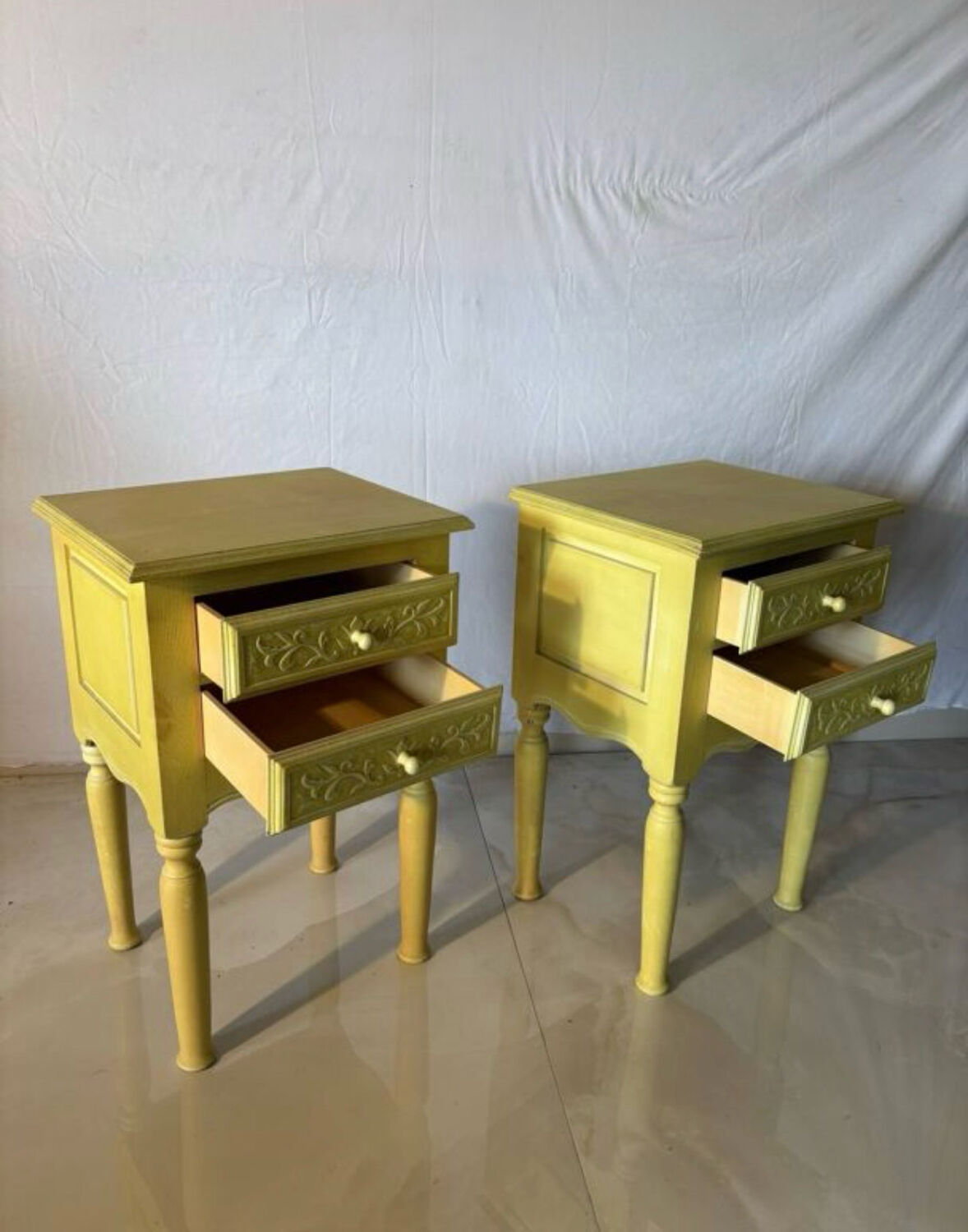 Pair of vintage carved wooden bedside tables.