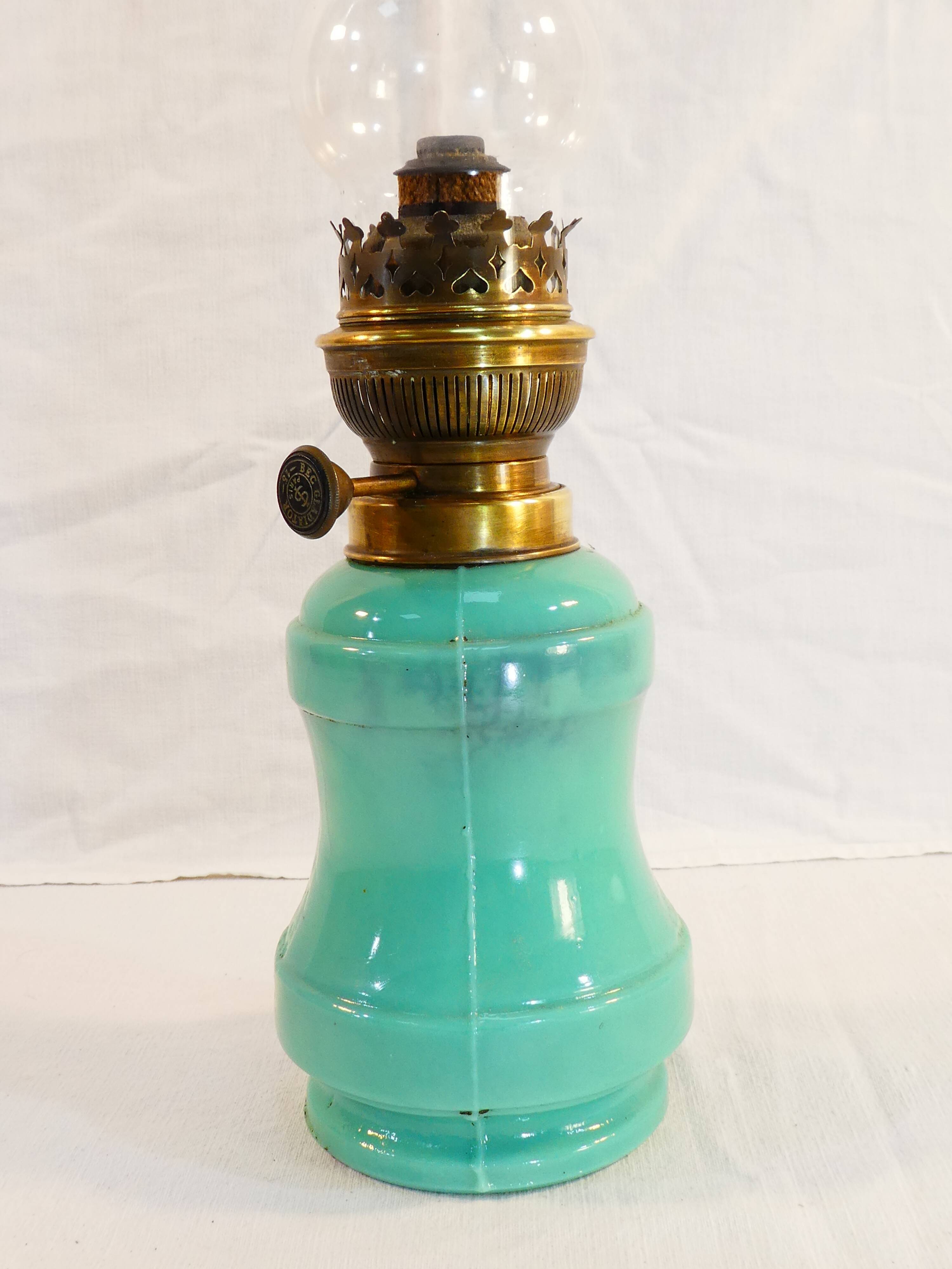 Ancient lampe a petrole in green opaline