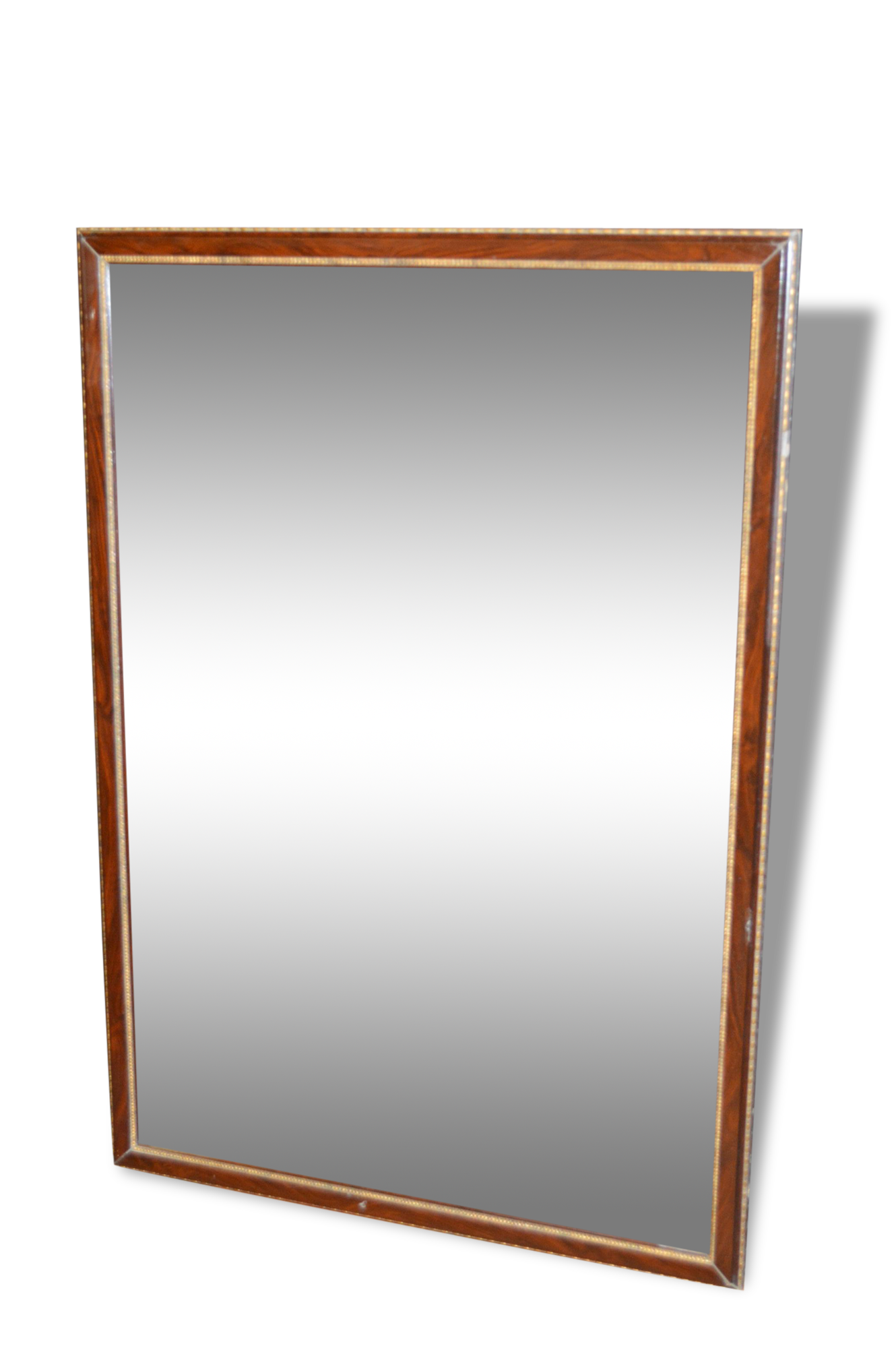 Mirror style restoration enhances brass mahogany