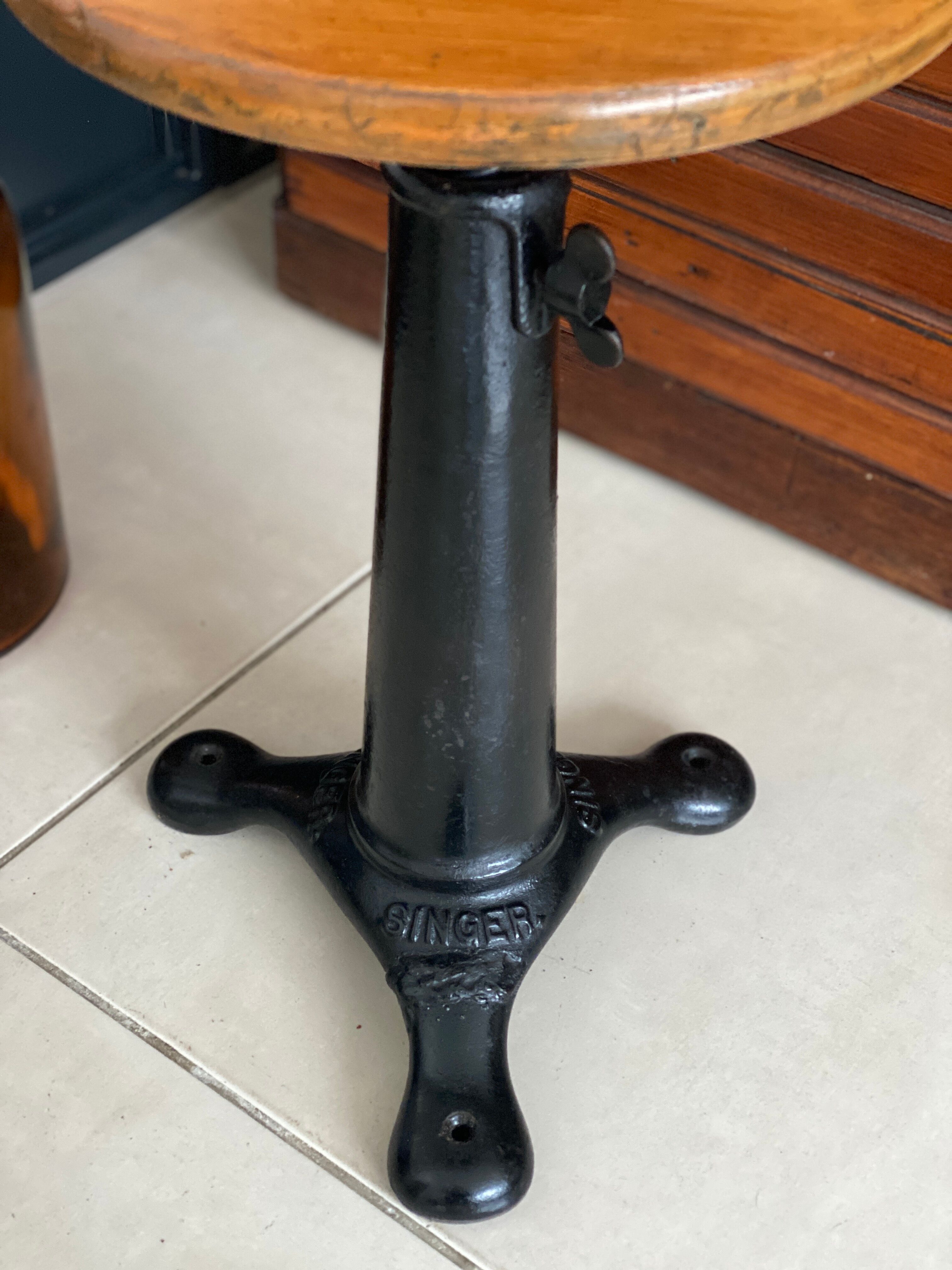Old industrial stool Singer