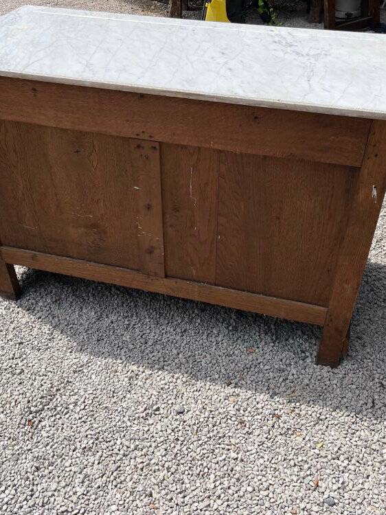 Commode with a white marble top