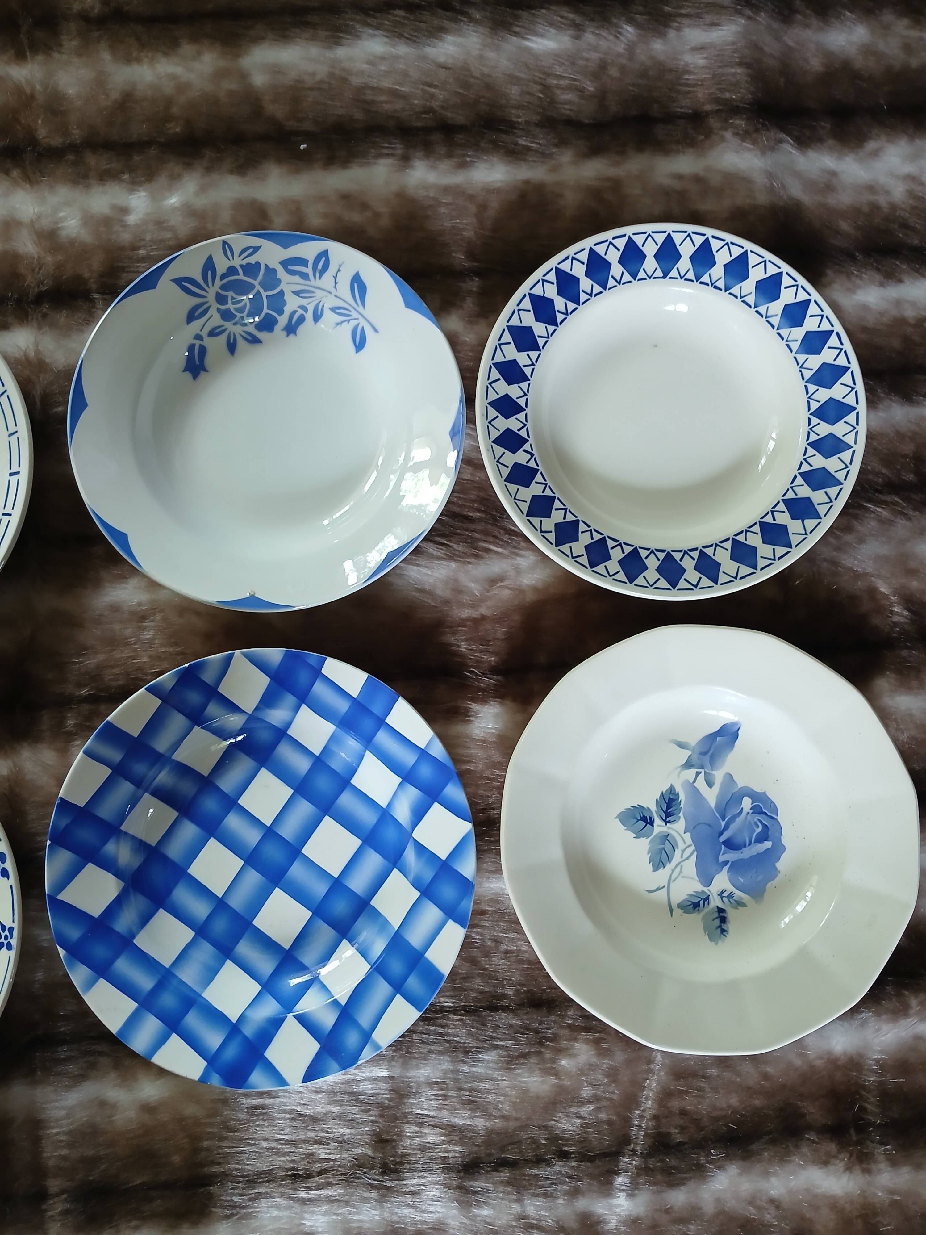 8 mismatched antique deep plates