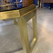 Octagonal brass coffee table, signed Anna Nora.