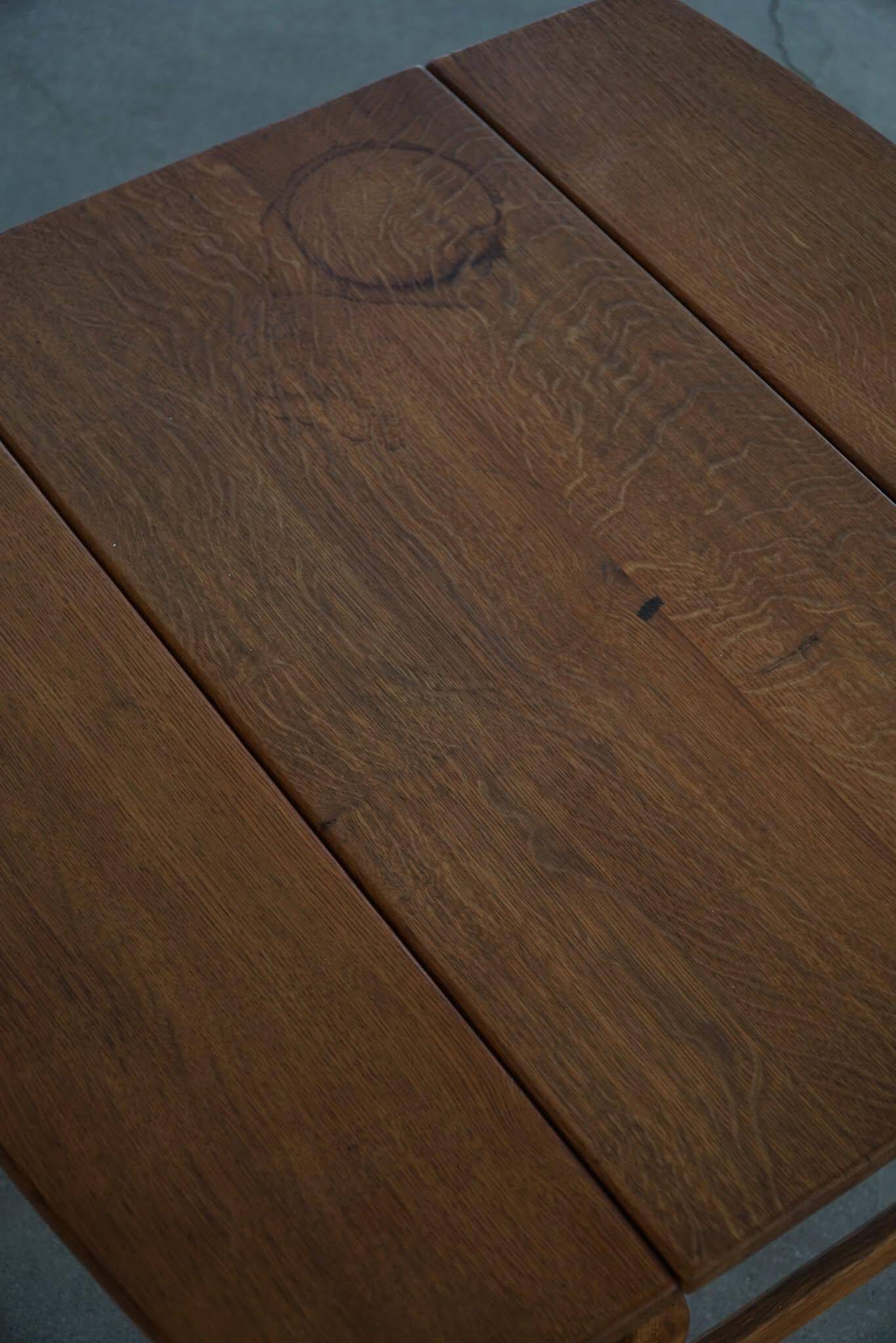 Modern Danish folding side table in solid oak, mid-20th century.