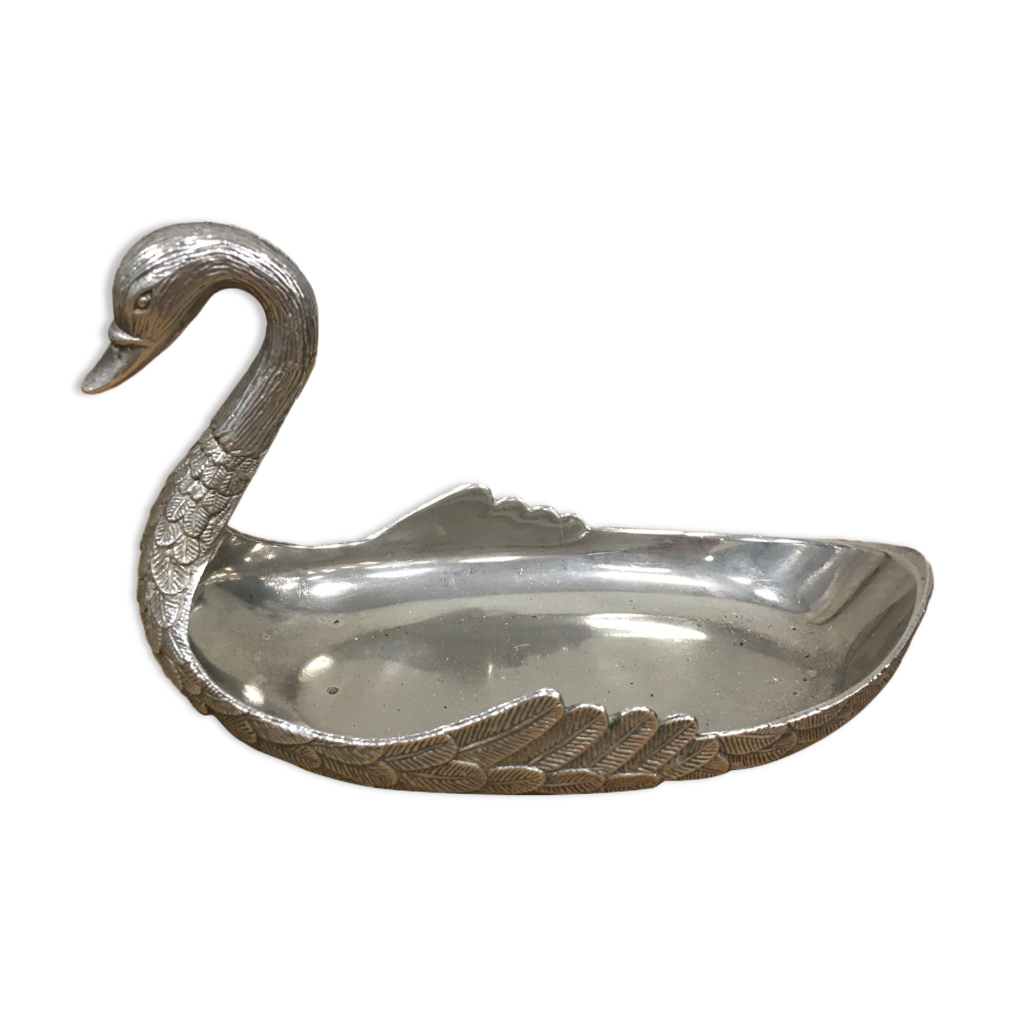 Empty silver metal swan pocket