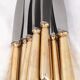 12 table knives model Baguette, golden handles, excellent condition.