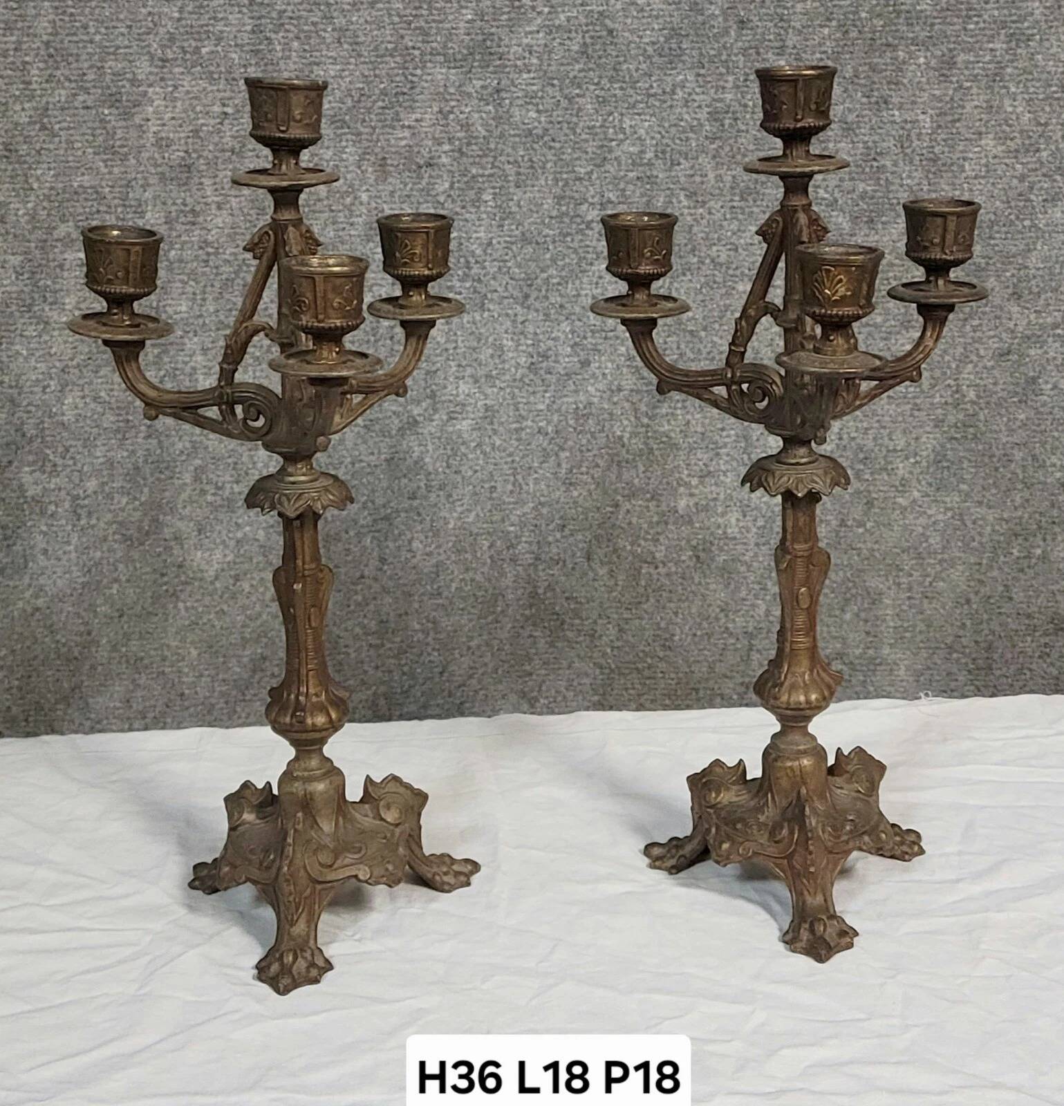 Pair of antique candelabra in patinated bronze spelter