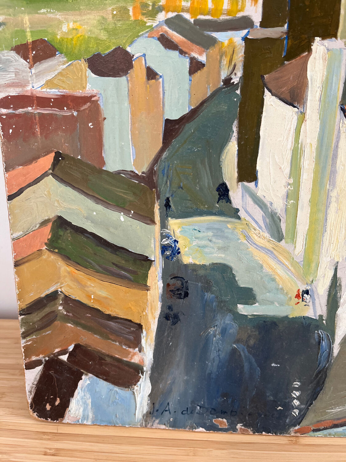 Castle in the rooftops, oil on wood panel, signed JA Dompierre.