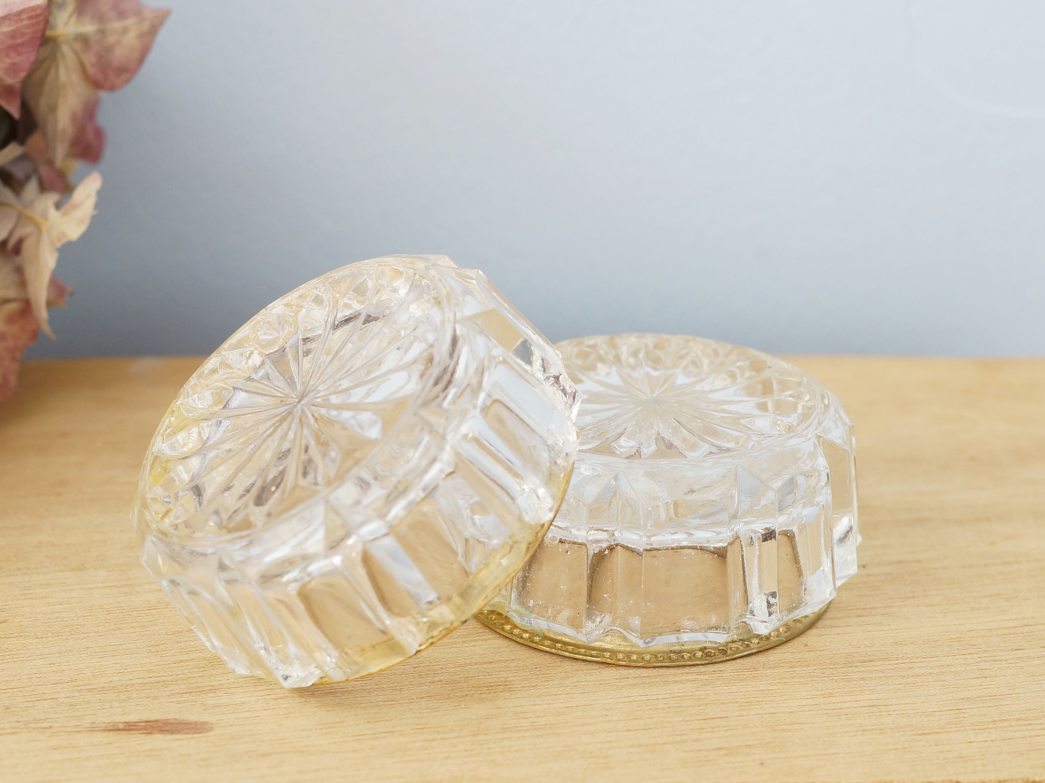 Set of two crystal buds with brass border, vintage