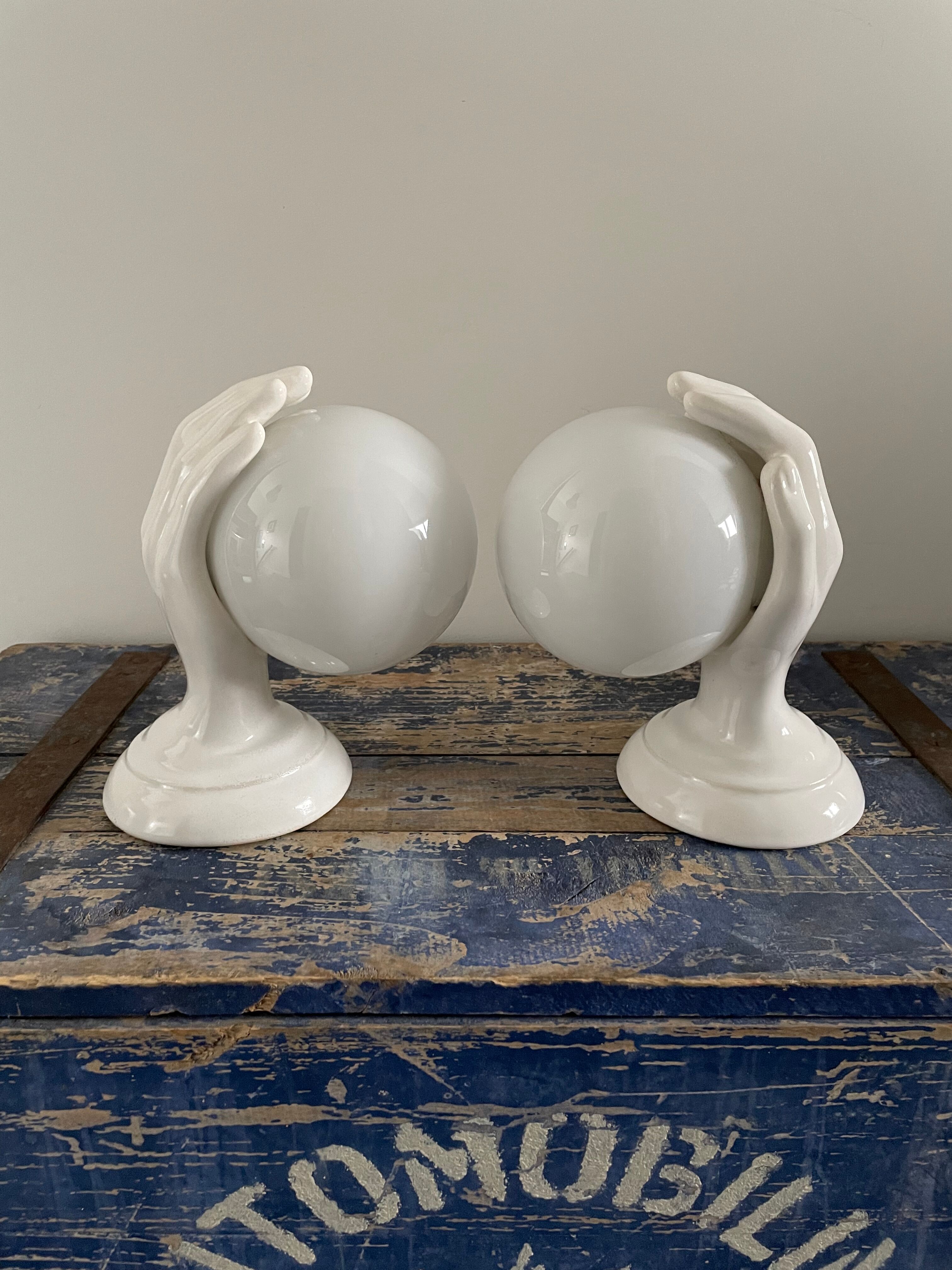 Set of two white ceramic hand sconces