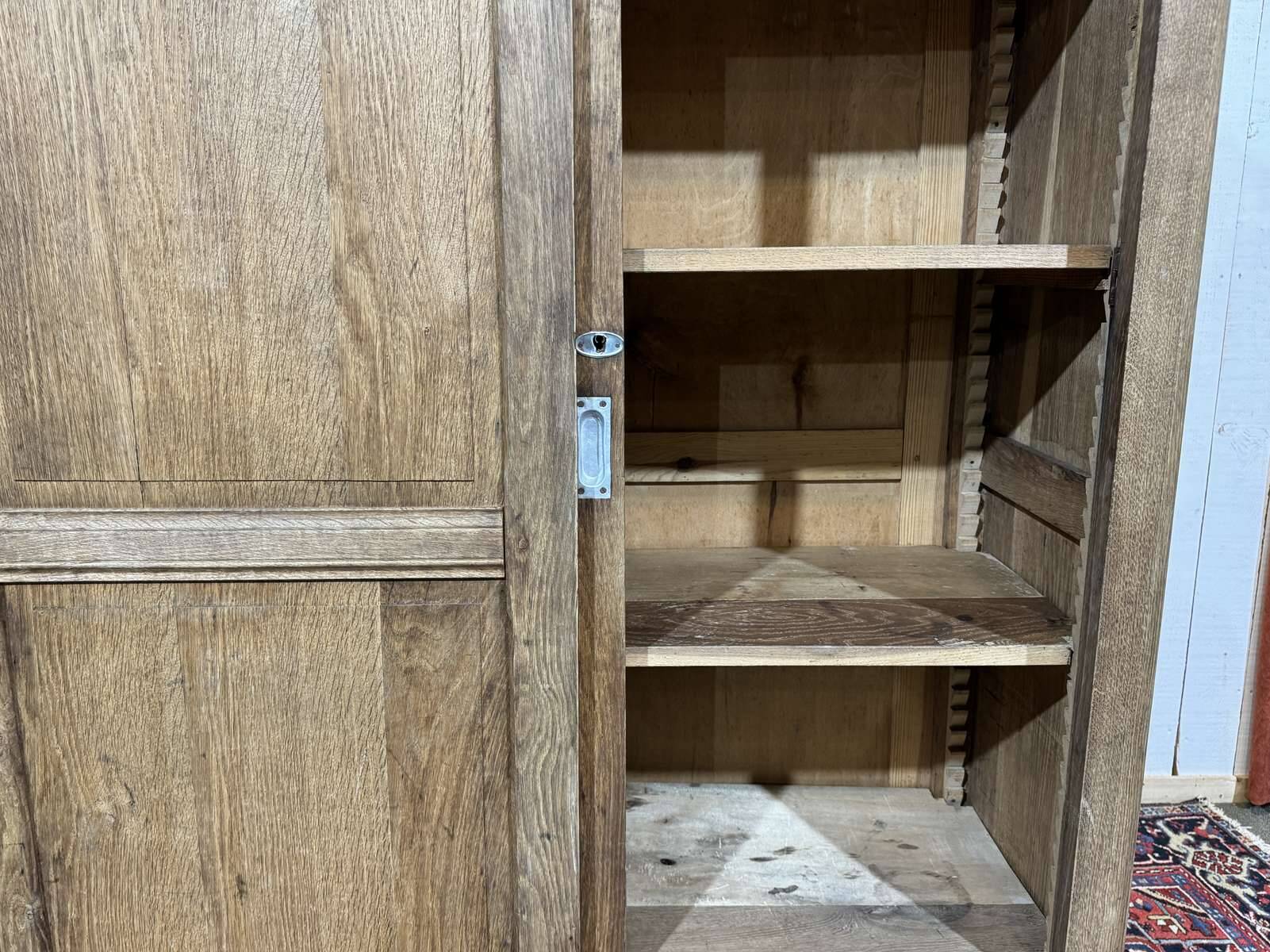 Oak wardrobe with sliding doors from the 1930s.