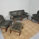 Modulable sofa an armchair in leather and wood