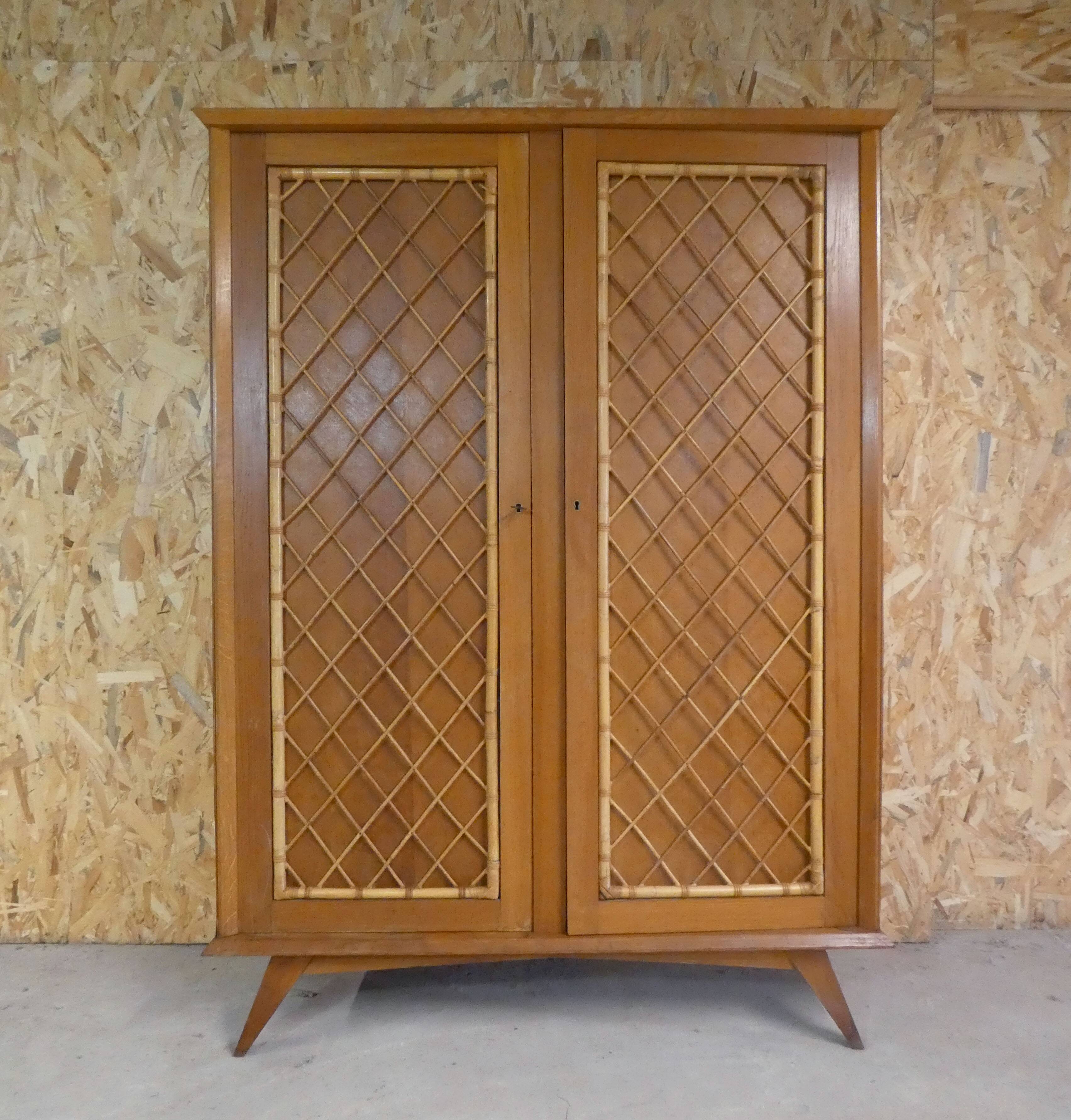 rattan cabinet with compass feet