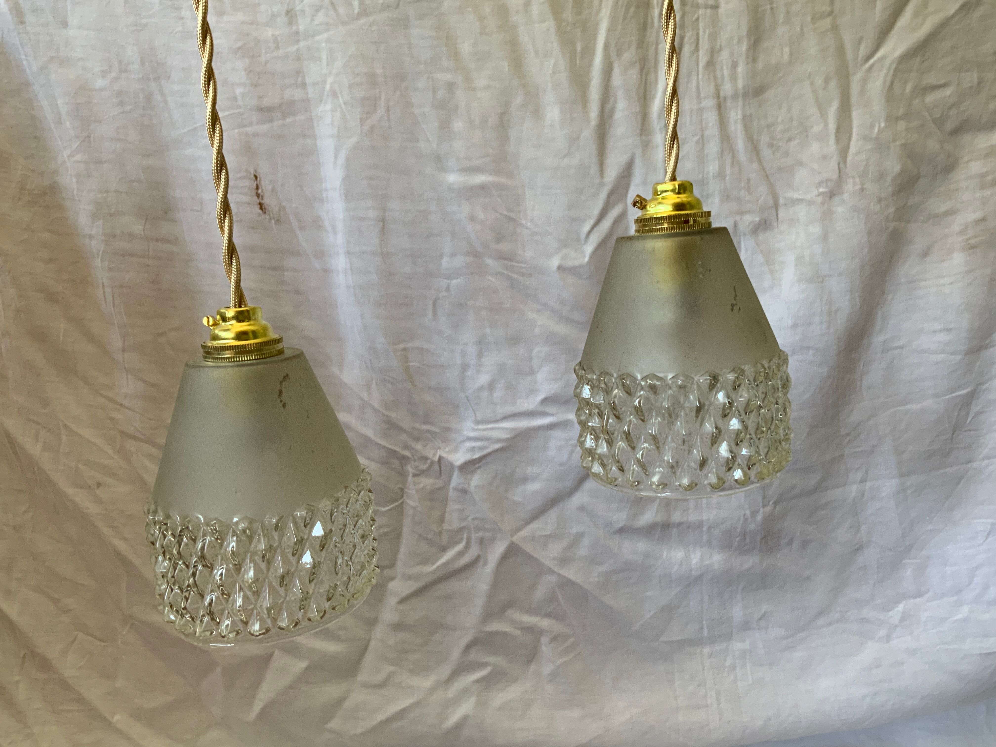 Trio of vintage suspensions