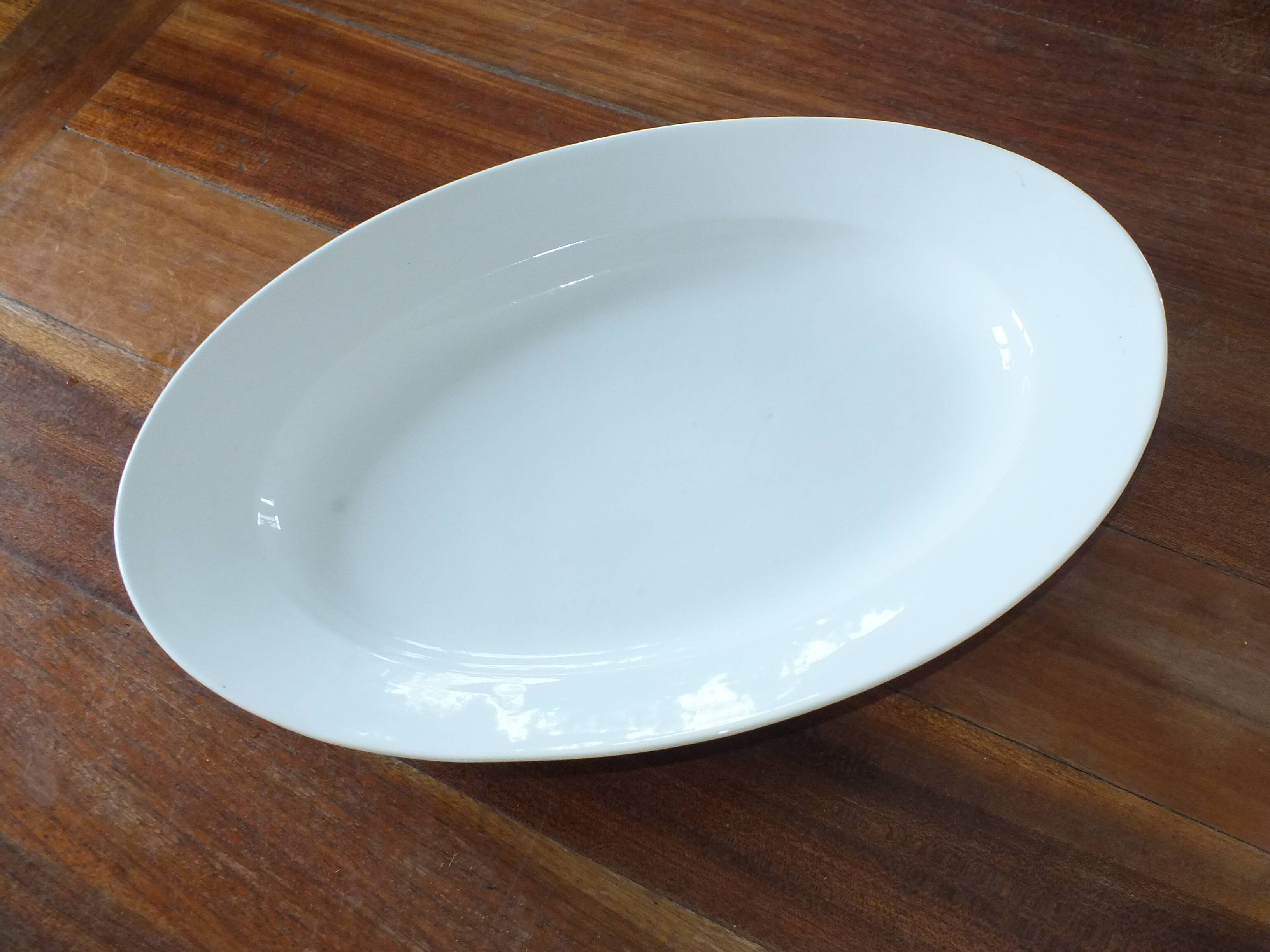 Large thick dish in white porcelain from Paris 19th