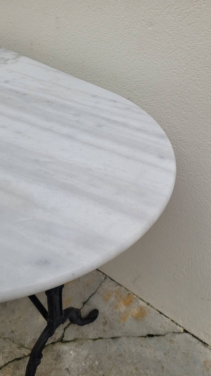Antique cast iron bistro table with oval marble top
