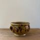 Vintage ceramic flowerpot with braided ears
