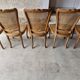 5 old cane-seated solid oak chairs.