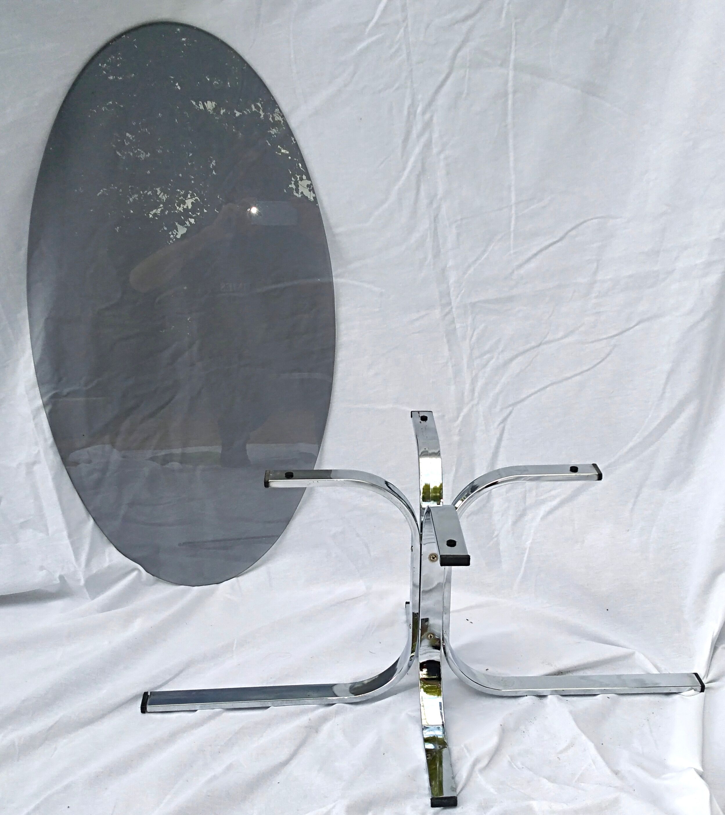 Oval glass coffee table smoked glass chromed metal