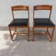 paire de chaises style scandinave, simili cuir noir